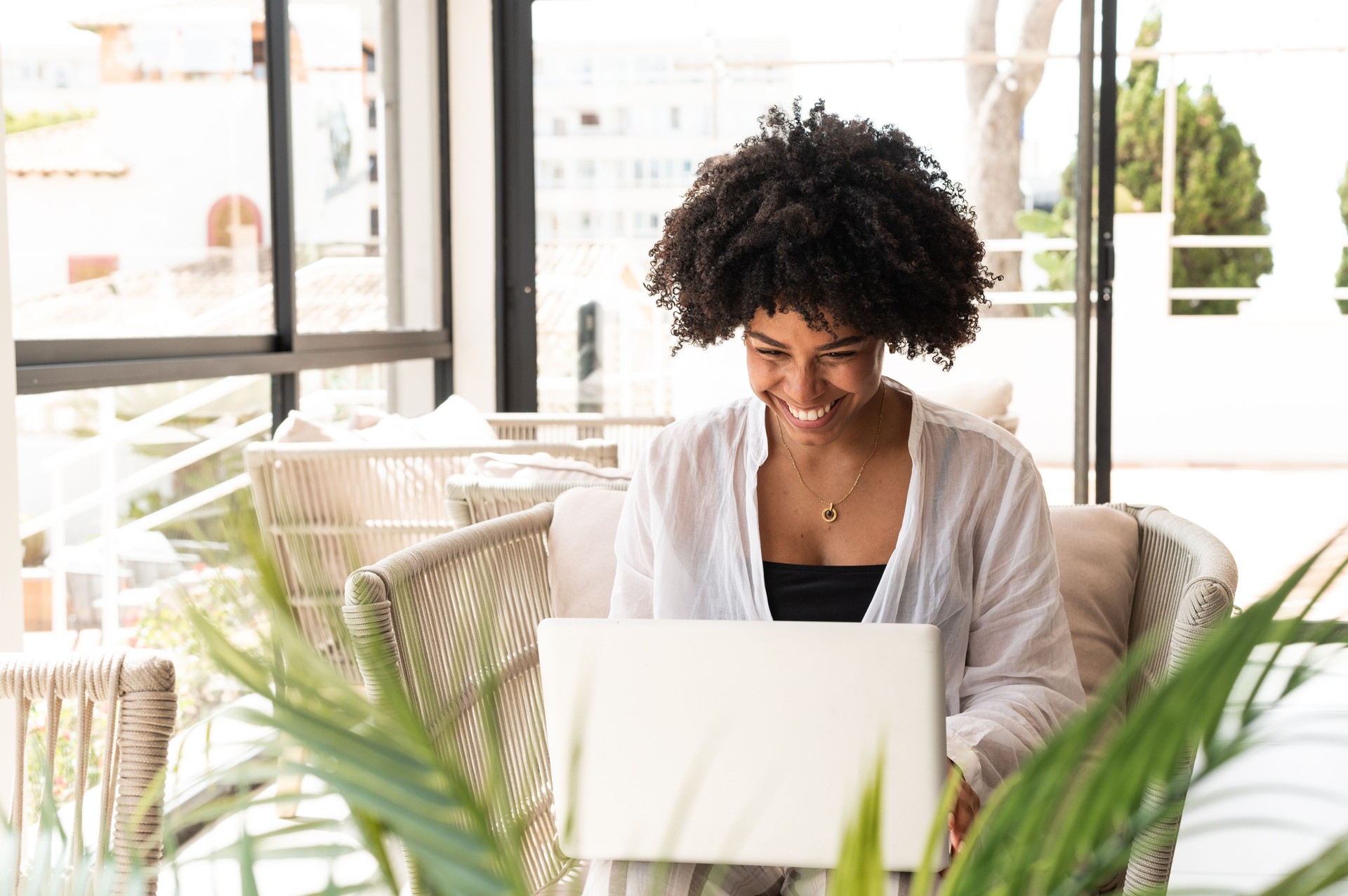 Woman working remotely on laptop